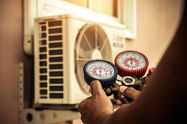 Professional Hvac technician working in Camanche, IA